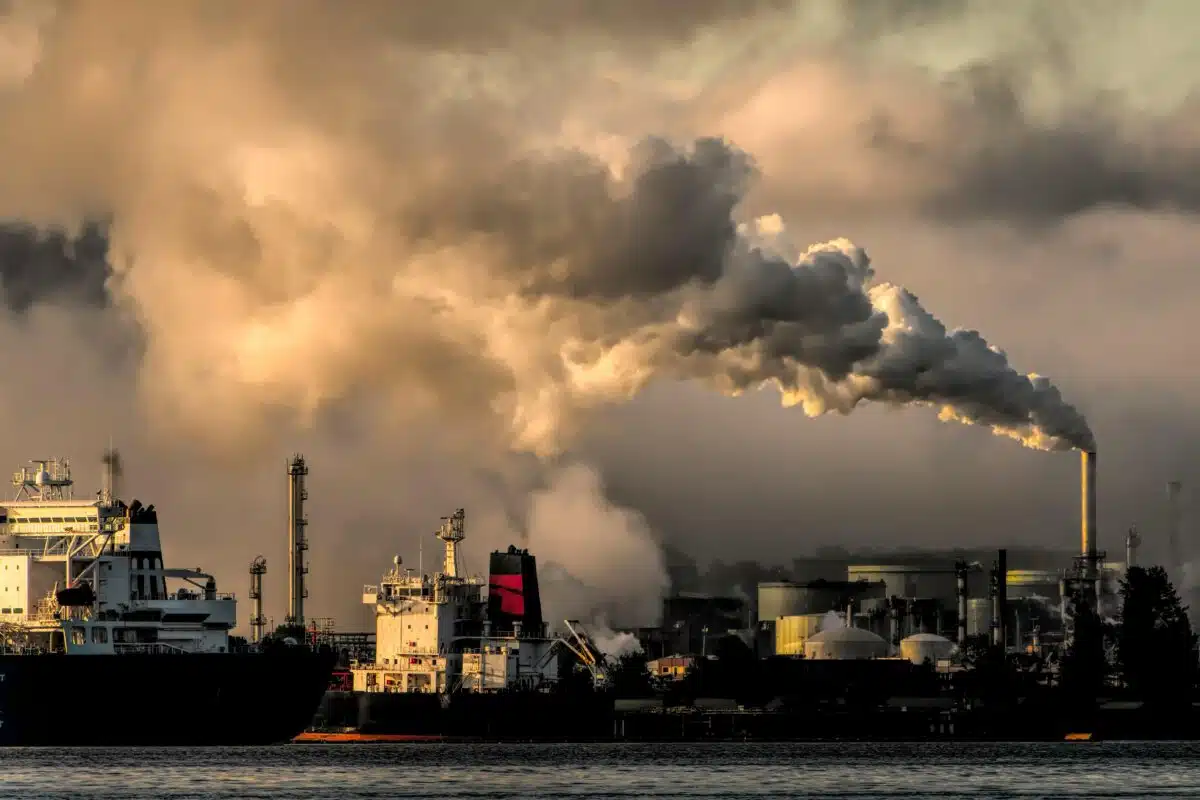 Image of a smoke stack leaving a factory